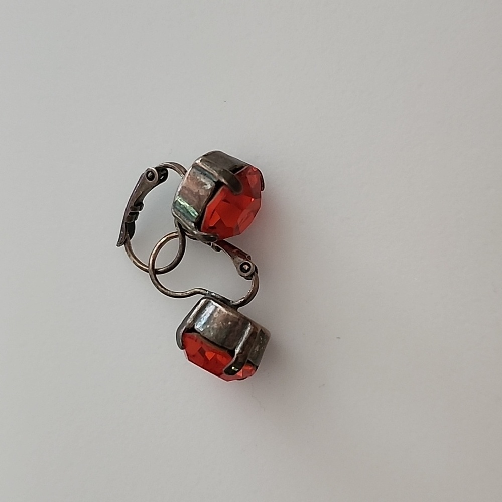Red crystal drop earrings.